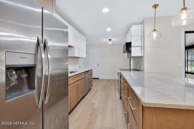 12128 Hidden Hills Drive Welcome to life inside the gated Hidden on Hidden Hills Country Club in Florida - for sale on GolfHomes.com, golf home, golf lot