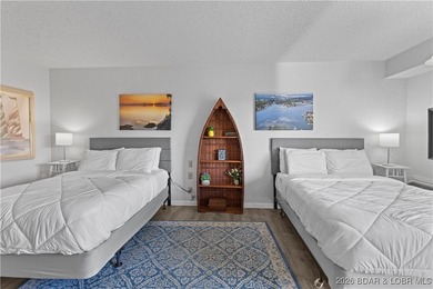 Located in the iconic Tan Tar A Estates, adjacent to on The Oaks Golf Course in Missouri - for sale on GolfHomes.com, golf home, golf lot