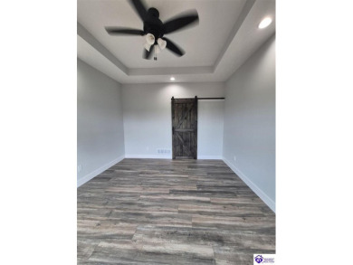 Must see to believe!  Contemporary home with an open floor plan on Lincoln Trail Country Club in Kentucky - for sale on GolfHomes.com, golf home, golf lot