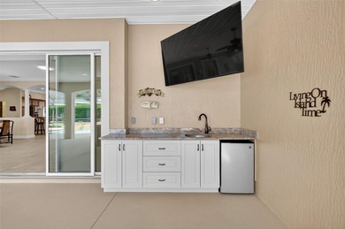 EXPERIENCE LUXURY LIVING in this EXQUISITE 3/3 EXPANDED, PREMIER on The Links of Spruce Creek in Florida - for sale on GolfHomes.com, golf home, golf lot