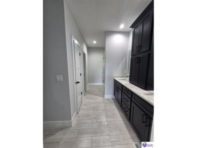 Must see to believe!  Contemporary home with an open floor plan on Lincoln Trail Country Club in Kentucky - for sale on GolfHomes.com, golf home, golf lot