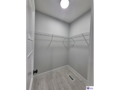 Must see to believe!  Contemporary home with an open floor plan on Lincoln Trail Country Club in Kentucky - for sale on GolfHomes.com, golf home, golf lot