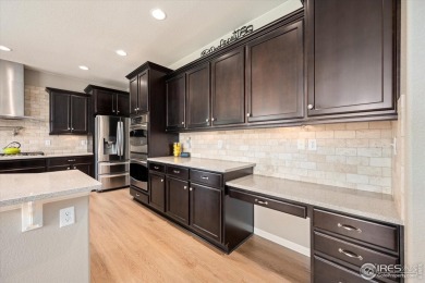 Welcome to this stunning home situated on a large cul-de-sac lot on Pelican Lakes Golf and Country Club in Colorado - for sale on GolfHomes.com, golf home, golf lot