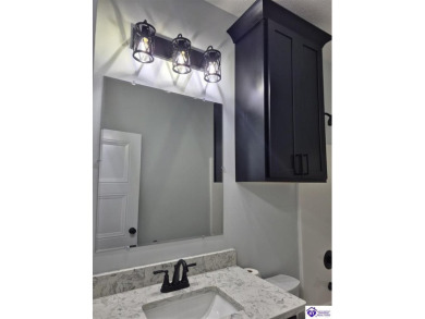 Must see to believe!  Contemporary home with an open floor plan on Lincoln Trail Country Club in Kentucky - for sale on GolfHomes.com, golf home, golf lot
