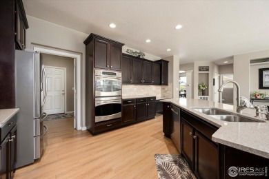 Welcome to this stunning home situated on a large cul-de-sac lot on Pelican Lakes Golf and Country Club in Colorado - for sale on GolfHomes.com, golf home, golf lot