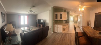This one grabs your attention immediately as you approach the on Golden Lakes Golf Course in Florida - for sale on GolfHomes.com, golf home, golf lot