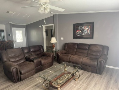 This one grabs your attention immediately as you approach the on Golden Lakes Golf Course in Florida - for sale on GolfHomes.com, golf home, golf lot