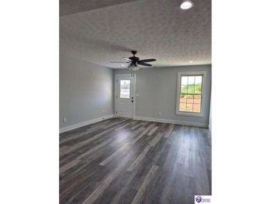 Must see to believe!  Contemporary home with an open floor plan on Lincoln Trail Country Club in Kentucky - for sale on GolfHomes.com, golf home, golf lot
