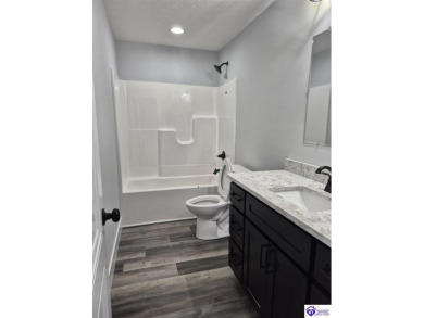 Must see to believe!  Contemporary home with an open floor plan on Lincoln Trail Country Club in Kentucky - for sale on GolfHomes.com, golf home, golf lot