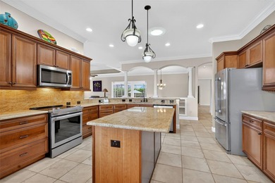 EXPERIENCE LUXURY LIVING in this EXQUISITE 3/3 EXPANDED, PREMIER on The Links of Spruce Creek in Florida - for sale on GolfHomes.com, golf home, golf lot