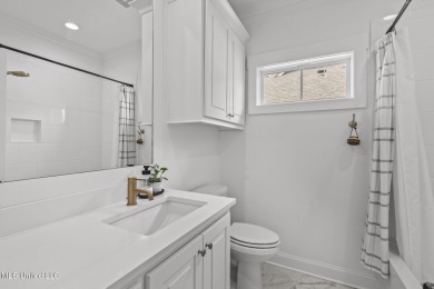 Welcome to this meticulously maintained 3-bedroom, 2-bath home on Lake Caroline Golf Club in Mississippi - for sale on GolfHomes.com, golf home, golf lot