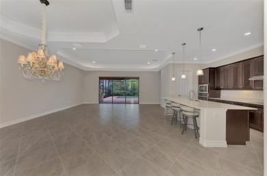 Prepare to be impressed by this beautifully upgraded golf home on Sarasota National Golf Club in Florida - for sale on GolfHomes.com, golf home, golf lot