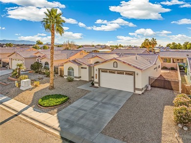 Step into a home that's been thoughtfully cared for and on Desert Lakes Golf Course in Arizona - for sale on GolfHomes.com, golf home, golf lot