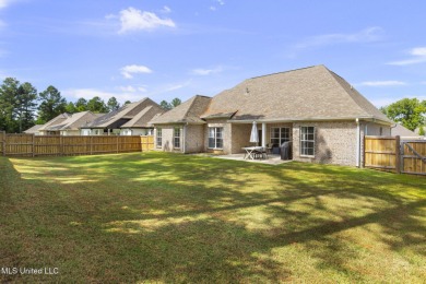 Welcome to this meticulously maintained 3-bedroom, 2-bath home on Lake Caroline Golf Club in Mississippi - for sale on GolfHomes.com, golf home, golf lot