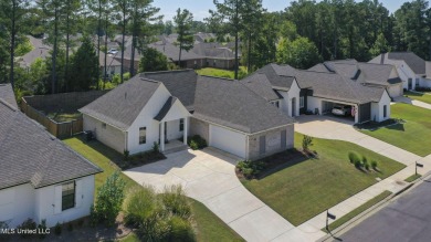 Welcome to this meticulously maintained 3-bedroom, 2-bath home on Lake Caroline Golf Club in Mississippi - for sale on GolfHomes.com, golf home, golf lot