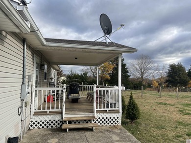 This charming 3 bedroom, 2 bath home is located 5 minutes from on Arrowhead Golf Club in Kentucky - for sale on GolfHomes.com, golf home, golf lot