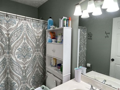 This charming 3 bedroom, 2 bath home is located 5 minutes from on Arrowhead Golf Club in Kentucky - for sale on GolfHomes.com, golf home, golf lot