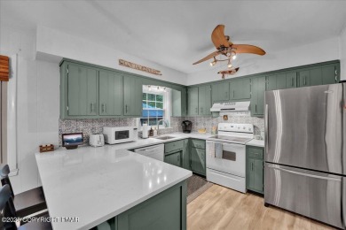 Turnkey Contemporary in the Heart of Lake Harmony - This on Split Rock Resort and Country Club in Pennsylvania - for sale on GolfHomes.com, golf home, golf lot