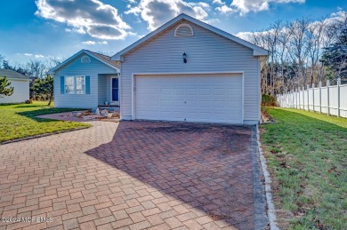 This lovely ranch-style home in the Eagle Bay neighborhood of on Ocean County Golf Course At Atlantis in New Jersey - for sale on GolfHomes.com, golf home, golf lot