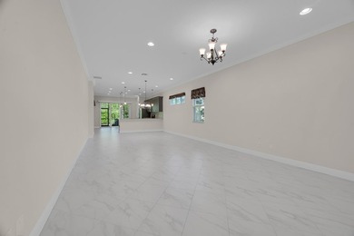 This beautifully maintained home offers the perfect blend of on PGA Golf Club in PGA Village in Florida - for sale on GolfHomes.com, golf home, golf lot