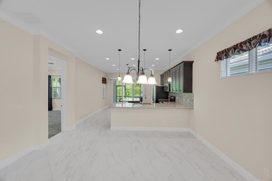 This beautifully maintained home offers the perfect blend of on PGA Golf Club in PGA Village in Florida - for sale on GolfHomes.com, golf home, golf lot