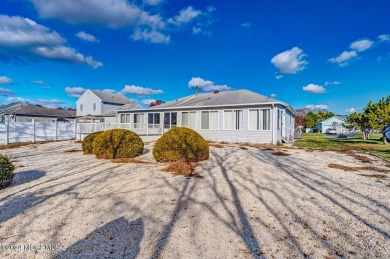 This lovely ranch-style home in the Eagle Bay neighborhood of on Ocean County Golf Course At Atlantis in New Jersey - for sale on GolfHomes.com, golf home, golf lot