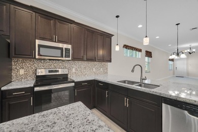 This beautifully maintained home offers the perfect blend of on PGA Golf Club in PGA Village in Florida - for sale on GolfHomes.com, golf home, golf lot