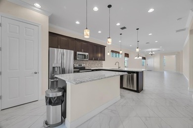 This beautifully maintained home offers the perfect blend of on PGA Golf Club in PGA Village in Florida - for sale on GolfHomes.com, golf home, golf lot