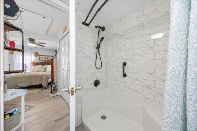 Discover the charm of this beautifully updated 2-bedroom on Country Club At Silver Springs Shores in Florida - for sale on GolfHomes.com, golf home, golf lot