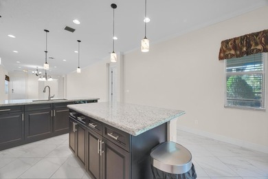 This beautifully maintained home offers the perfect blend of on PGA Golf Club in PGA Village in Florida - for sale on GolfHomes.com, golf home, golf lot