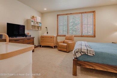 This attractive duplex is perfectly positioned to overlook the on Aspen Glen Club in Colorado - for sale on GolfHomes.com, golf home, golf lot