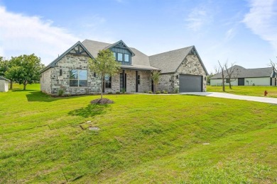 New construction 4 bedroom full 3 bath 2 car garage with a golf on Pecan Plantation Country Club in Texas - for sale on GolfHomes.com, golf home, golf lot