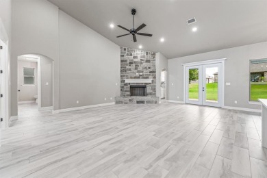 New construction 4 bedroom full 3 bath 2 car garage with a golf on Pecan Plantation Country Club in Texas - for sale on GolfHomes.com, golf home, golf lot