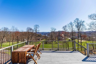 Gaze at the stunning views from the deck of this extraordinary on Mountain View Golf Course in West Virginia - for sale on GolfHomes.com, golf home, golf lot