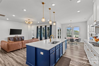 This stunning 4BR/3BA home in The Meridians offers an open floor on The Palisades Country Club in North Carolina - for sale on GolfHomes.com, golf home, golf lot