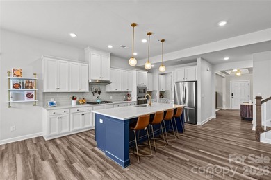 This stunning 4BR/3BA home in The Meridians offers an open floor on The Palisades Country Club in North Carolina - for sale on GolfHomes.com, golf home, golf lot