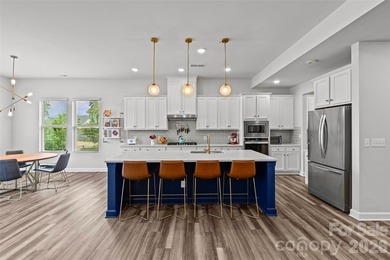 This stunning 4BR/3BA home in The Meridians offers an open floor on The Palisades Country Club in North Carolina - for sale on GolfHomes.com, golf home, golf lot