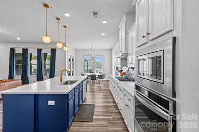 This stunning 4BR/3BA home in The Meridians offers an open floor on The Palisades Country Club in North Carolina - for sale on GolfHomes.com, golf home, golf lot