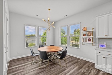 This stunning 4BR/3BA home in The Meridians offers an open floor on The Palisades Country Club in North Carolina - for sale on GolfHomes.com, golf home, golf lot