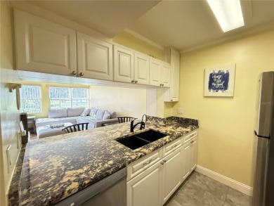 Not just another condo. This tastefully modern, affordable, low on Largo Golf Course in Florida - for sale on GolfHomes.com, golf home, golf lot