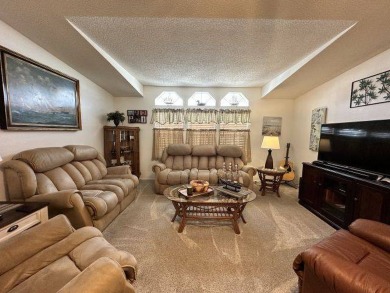 Welcome home to this warm and inviting TURNKEY house located on on Four Lakes Golf Club in Florida - for sale on GolfHomes.com, golf home, golf lot