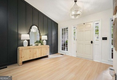 A Modern Cottage Retreat with Golf Course Views Front & Back on Canongate At Eagle Watch Golf Club in Georgia - for sale on GolfHomes.com, golf home, golf lot