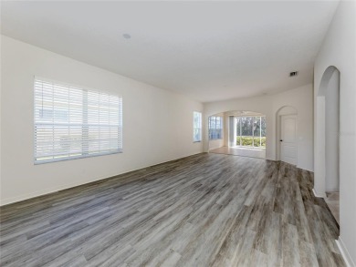 One or more photo(s) has been virtually staged. Step into a on Plantation Golf and Country Club in Florida - for sale on GolfHomes.com, golf home, golf lot