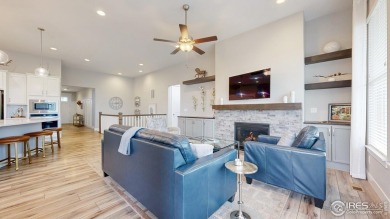 Beautiful ranch-style home backing to greenbelt in Windsor's on Raindance National Golf Course in Colorado - for sale on GolfHomes.com, golf home, golf lot