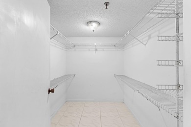 GORGEOUS FULLY 1ST FLOOR CONDO | PRESTIGIOUS 55+ COMMUNITY OF on  in Florida - for sale on GolfHomes.com, golf home, golf lot