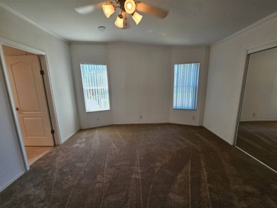 Some pictures have been virtually staged. This home is on leased on Big Cypress Golf and Country Club in Florida - for sale on GolfHomes.com, golf home, golf lot