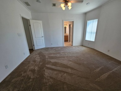 Some pictures have been virtually staged. This home is on leased on Big Cypress Golf and Country Club in Florida - for sale on GolfHomes.com, golf home, golf lot