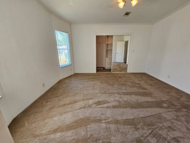 Some pictures have been virtually staged. This home is on leased on Big Cypress Golf and Country Club in Florida - for sale on GolfHomes.com, golf home, golf lot