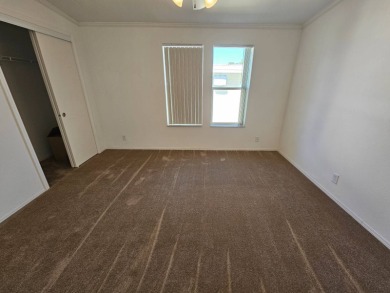 Some pictures have been virtually staged. This home is on leased on Big Cypress Golf and Country Club in Florida - for sale on GolfHomes.com, golf home, golf lot