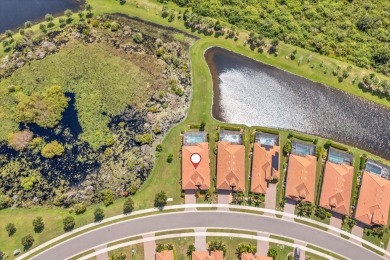 Fantastic views surround this impeccably maintained Golf Village on Sarasota National Golf Club in Florida - for sale on GolfHomes.com, golf home, golf lot